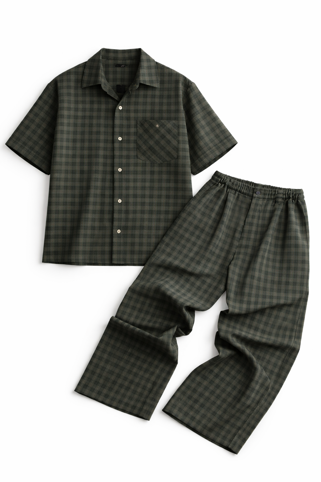 Green checkered shirt and pants set on a white background