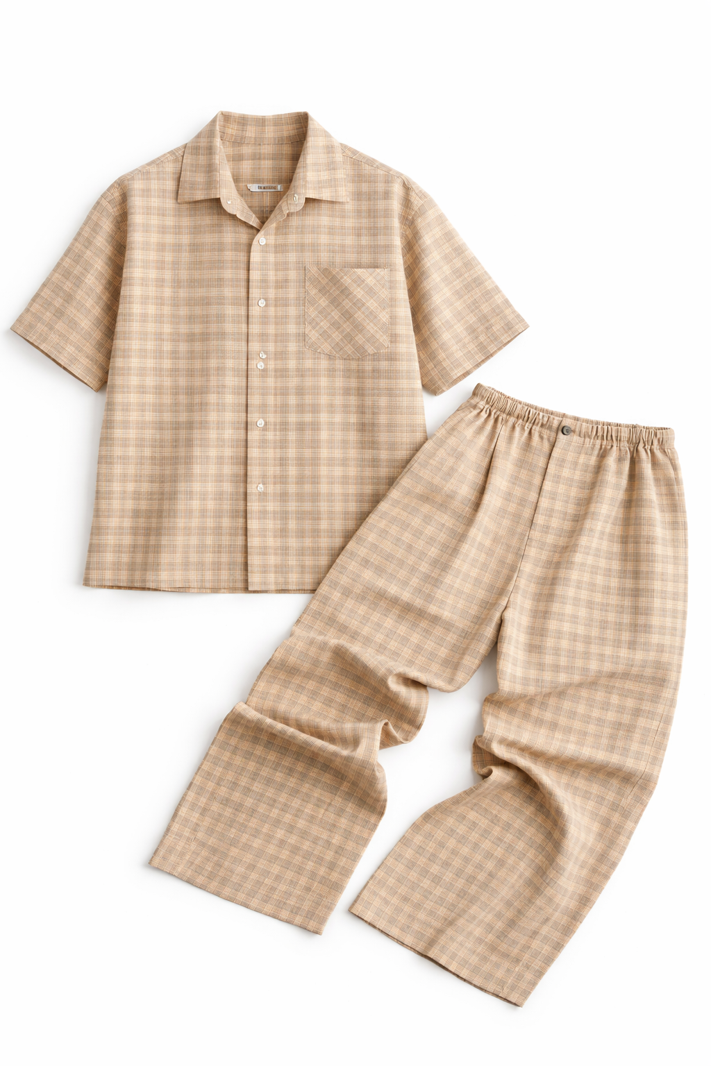 Beige checkered shirt and pants set on a white background